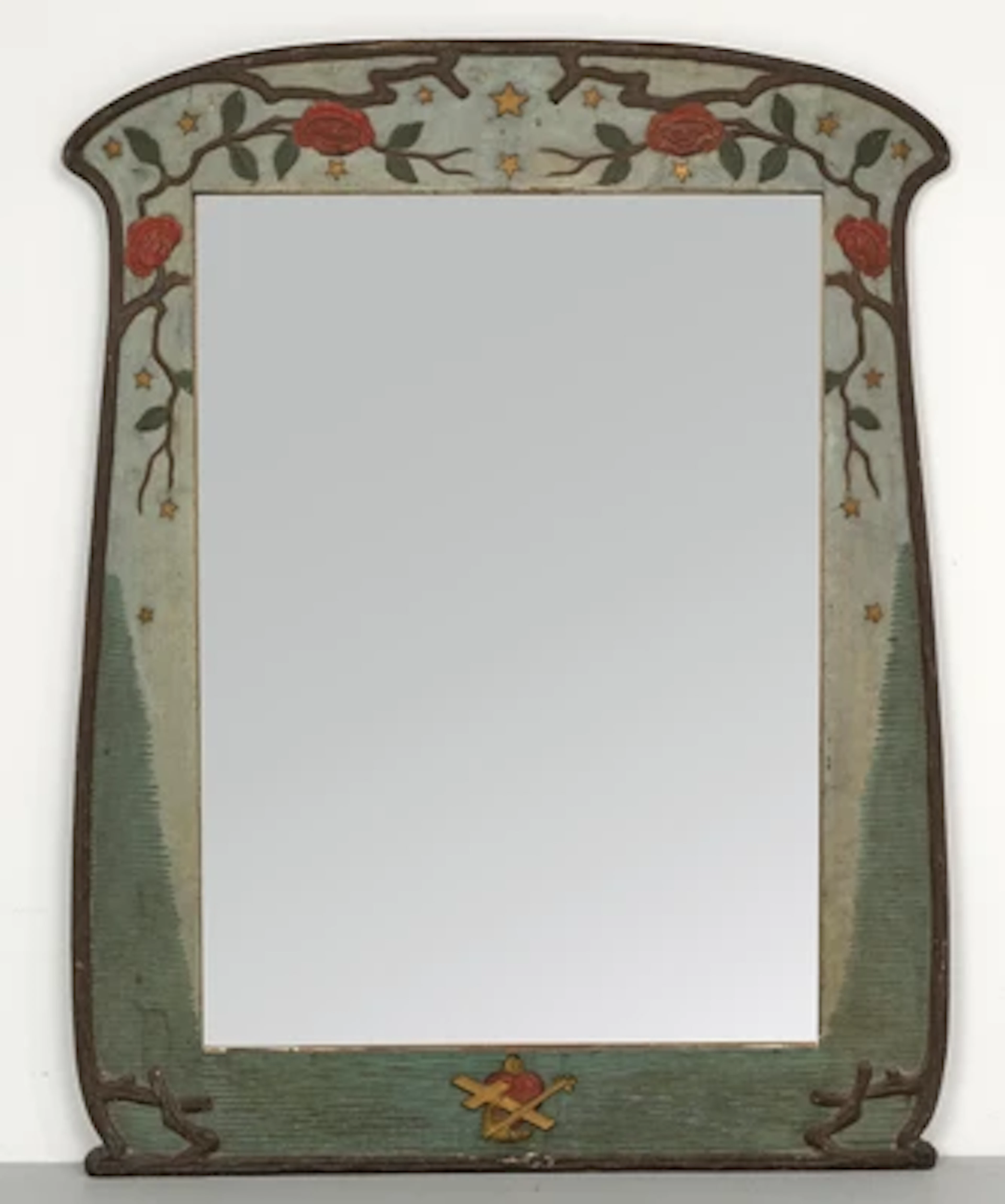 A large wall mirror of arabesque form with vegetal motifs, c. 1900