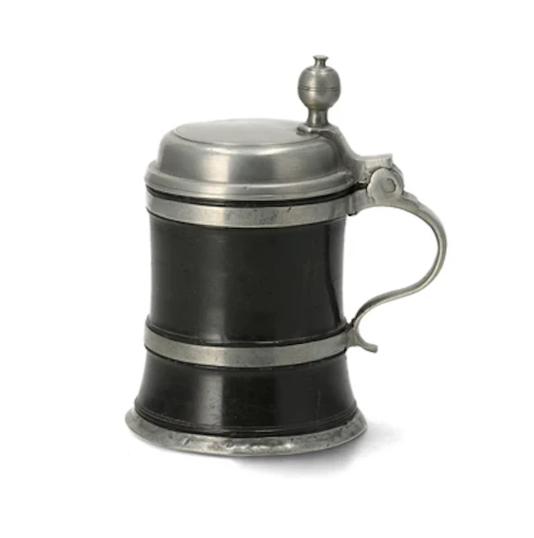 A Saxon Serpentine Tankard with Cover