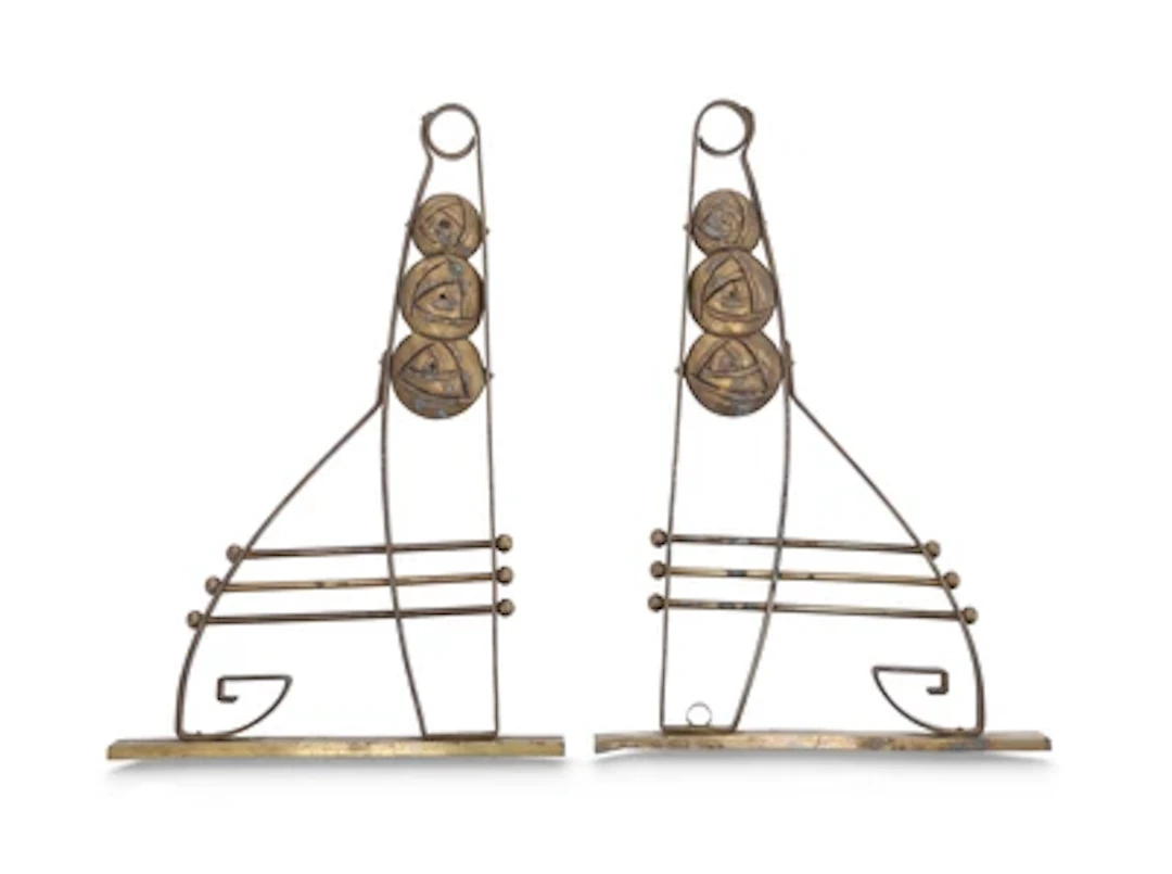 Two curtain-rod brackets with stylised rose decoration, c. 1900/15