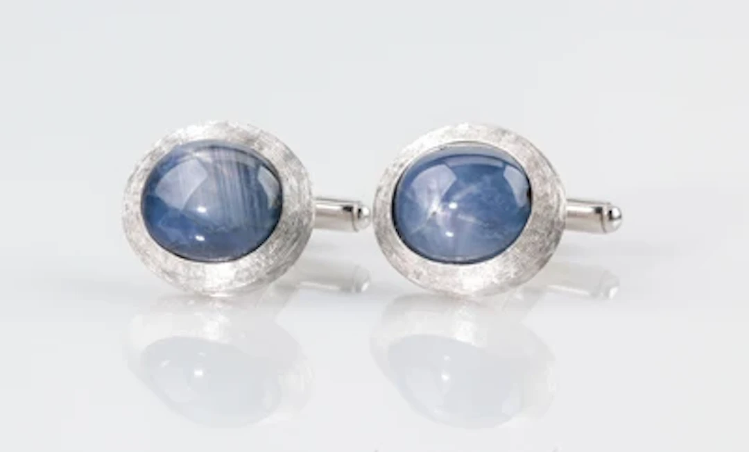 Sternsaphir Manschettenknöpfe zus. ca. 10,00 ct