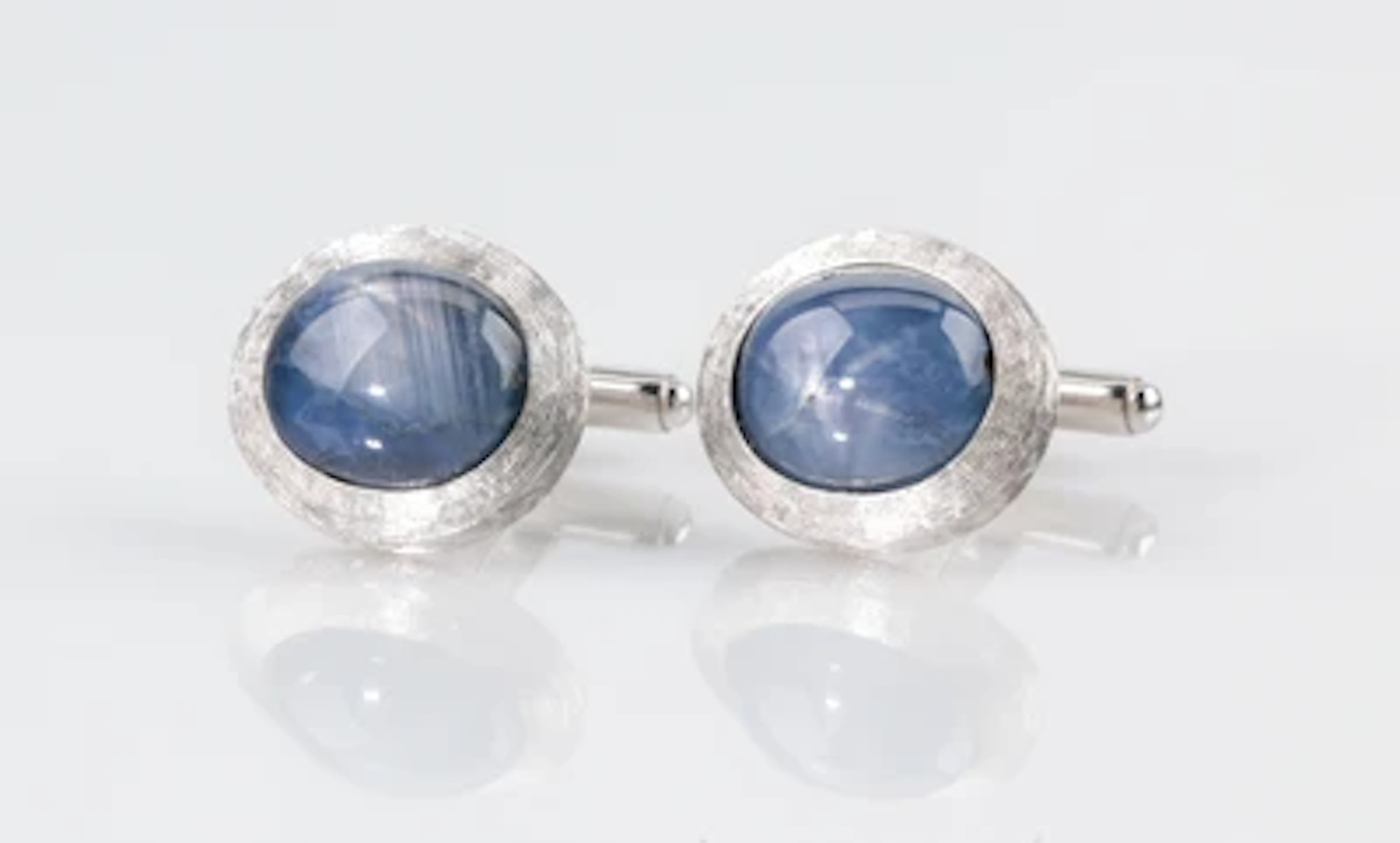 Sternsaphir Manschettenknöpfe zus. ca. 10,00 ct