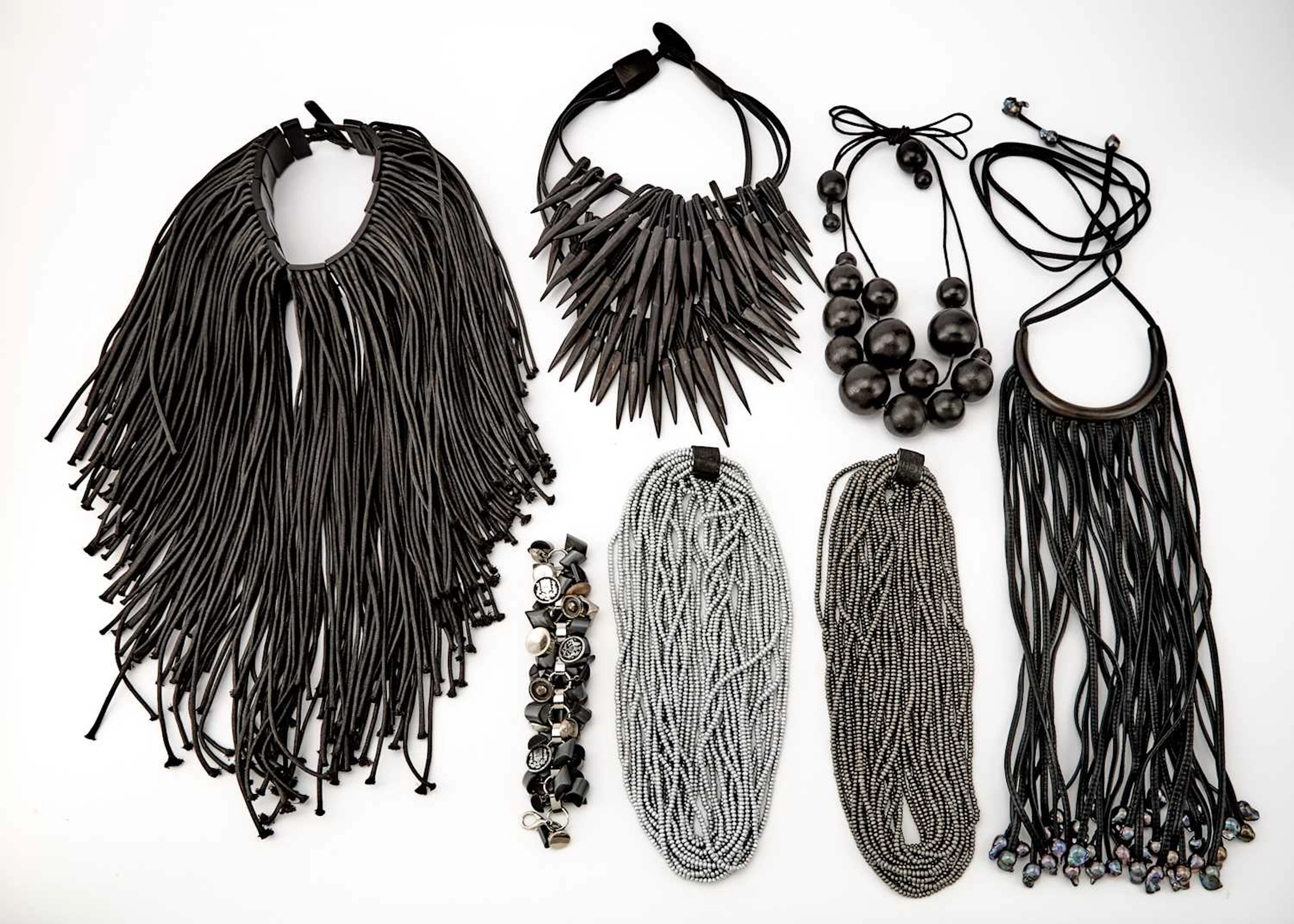 Group of Six Leather, Wood and Cloth Necklaces