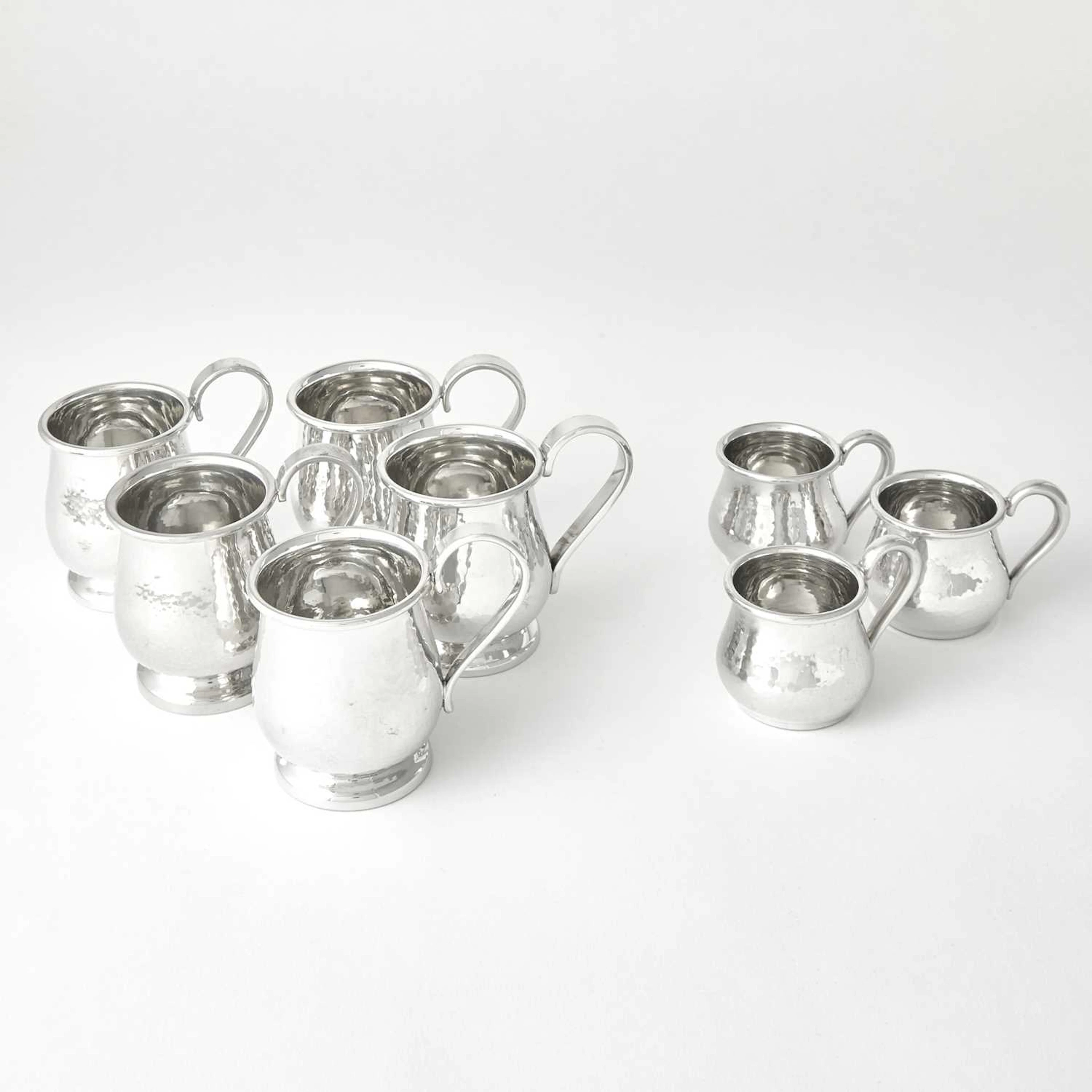 Group of Eight Cartier Pewter Mugs