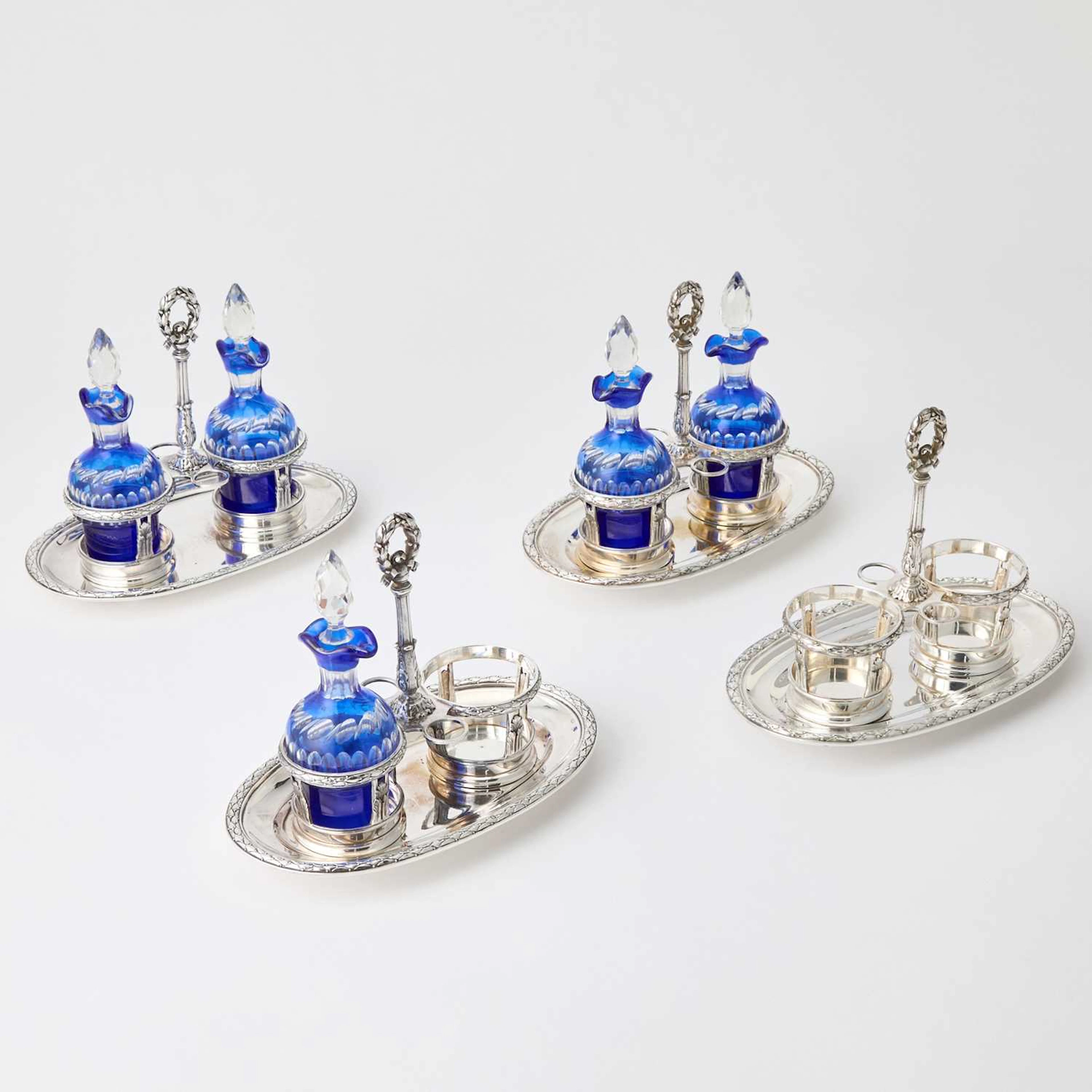 Four French Empire Style Sterling Silver and Glass Cruet Sets