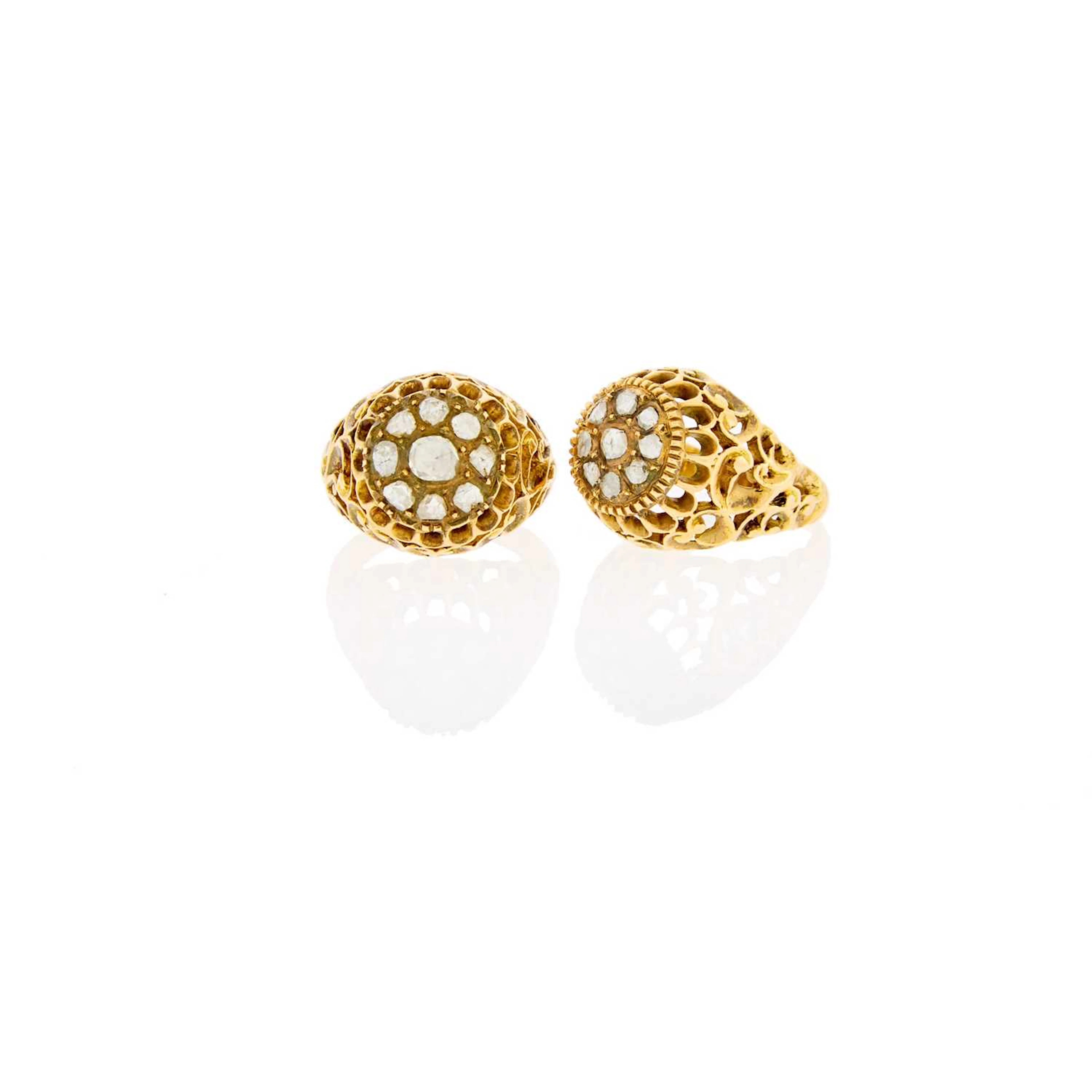 Pair of Gold and Foil-Backed Diamond Rings