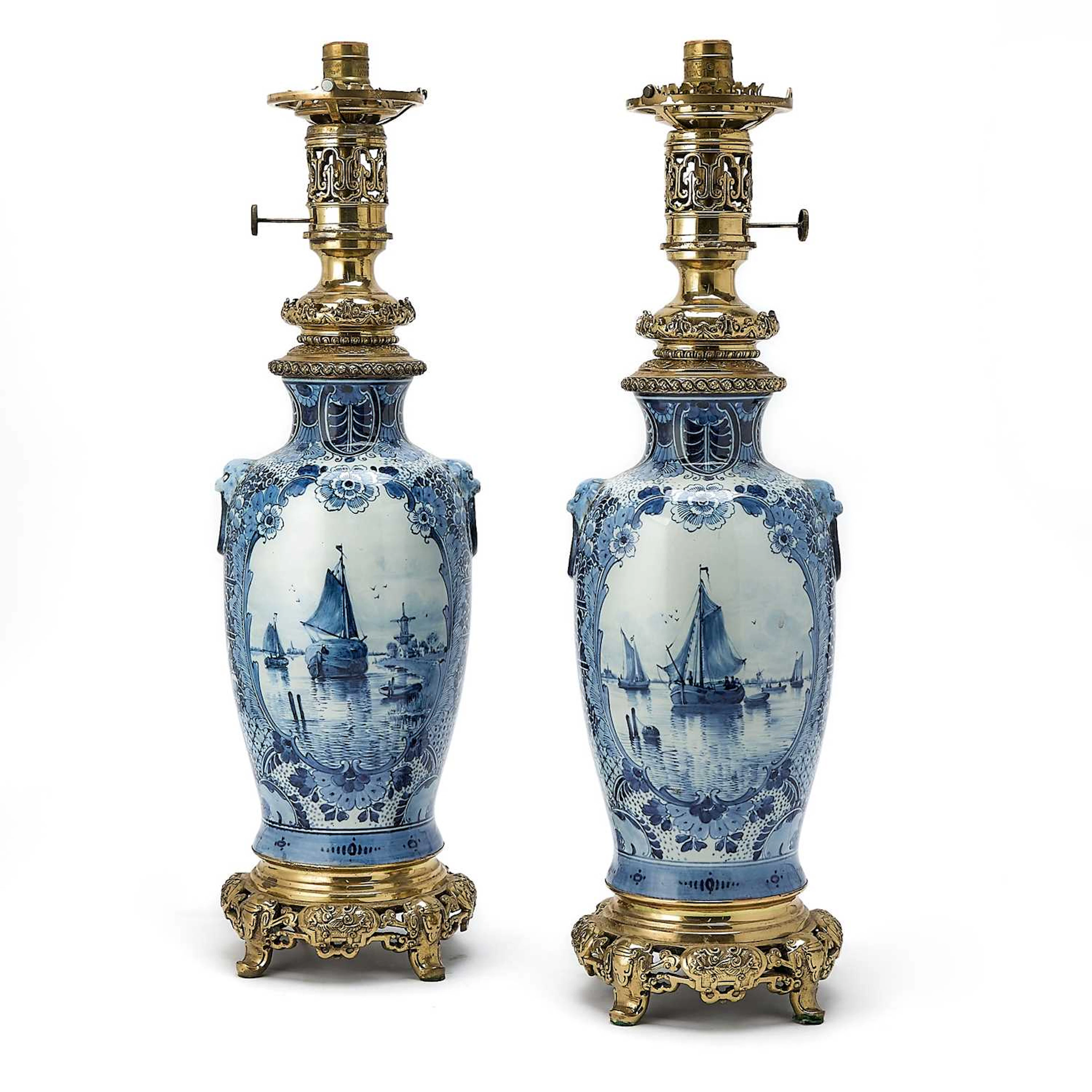 Pair of Delft Style Gilt-Metal Mounted Blue and White Porcelain Table Lamps