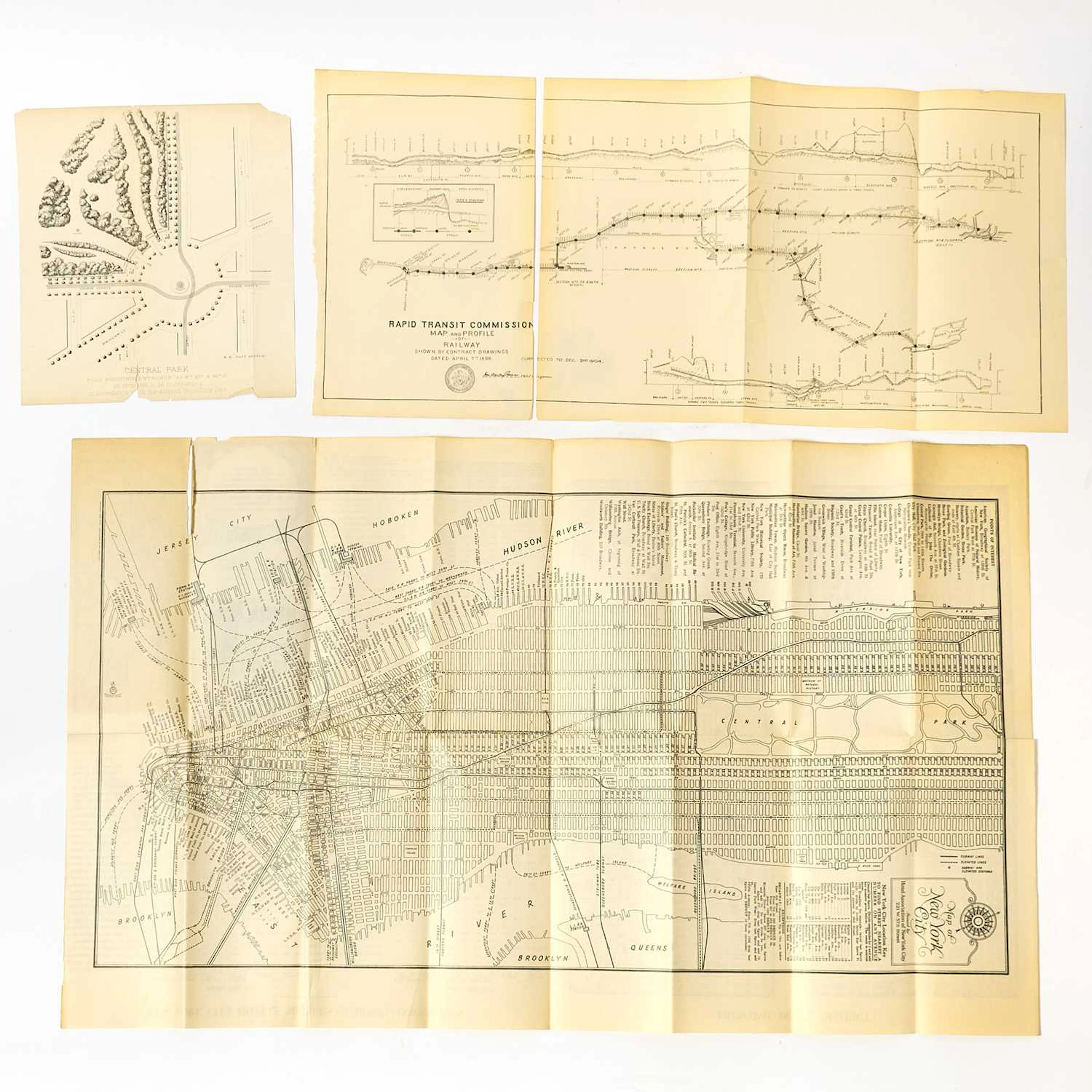 A print after Winslow Homer of central park and three maps of New York City