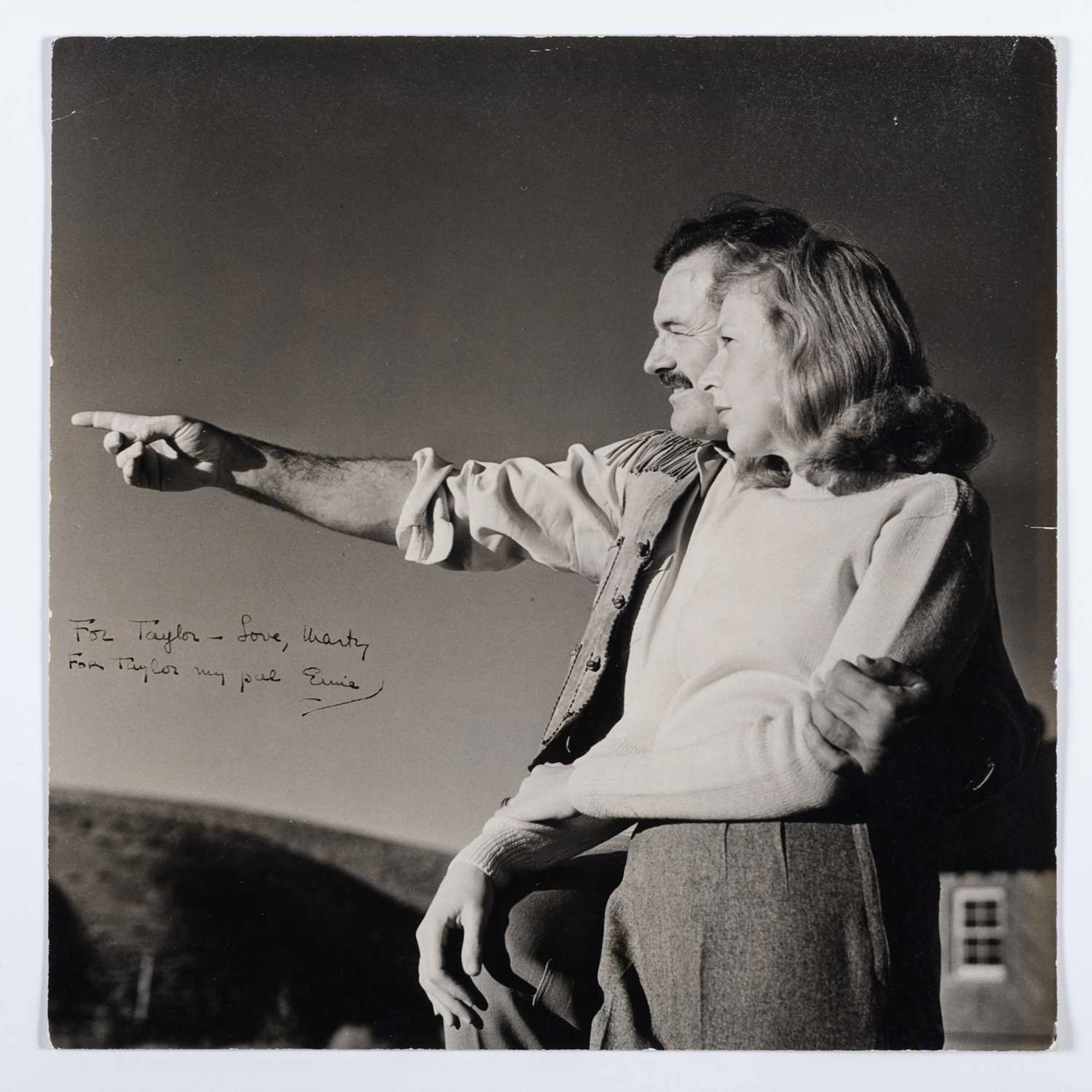 A fine and rare inscribed portrait of Ernest Hemingway and Martha