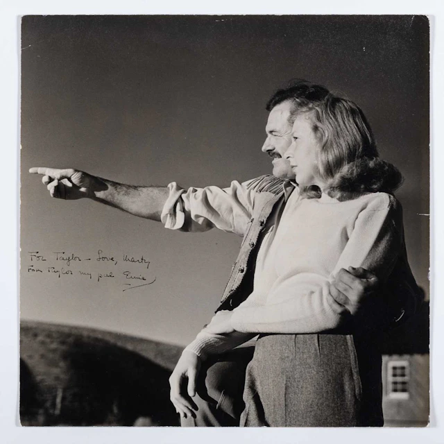 A fine and rare inscribed portrait of Ernest Hemingway and Martha