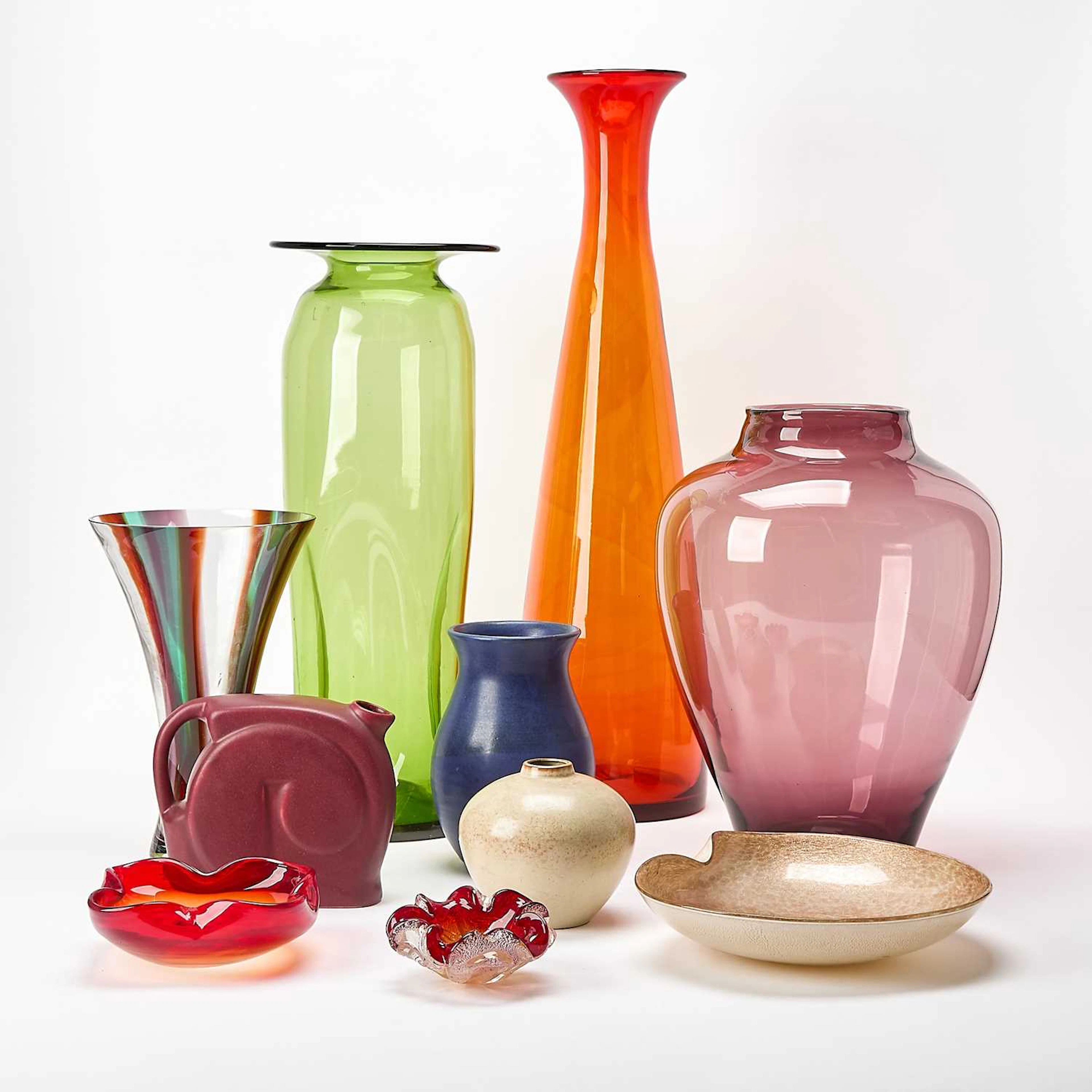 Group of Ten Blown Glass and Glazed Earthenware Table Articles