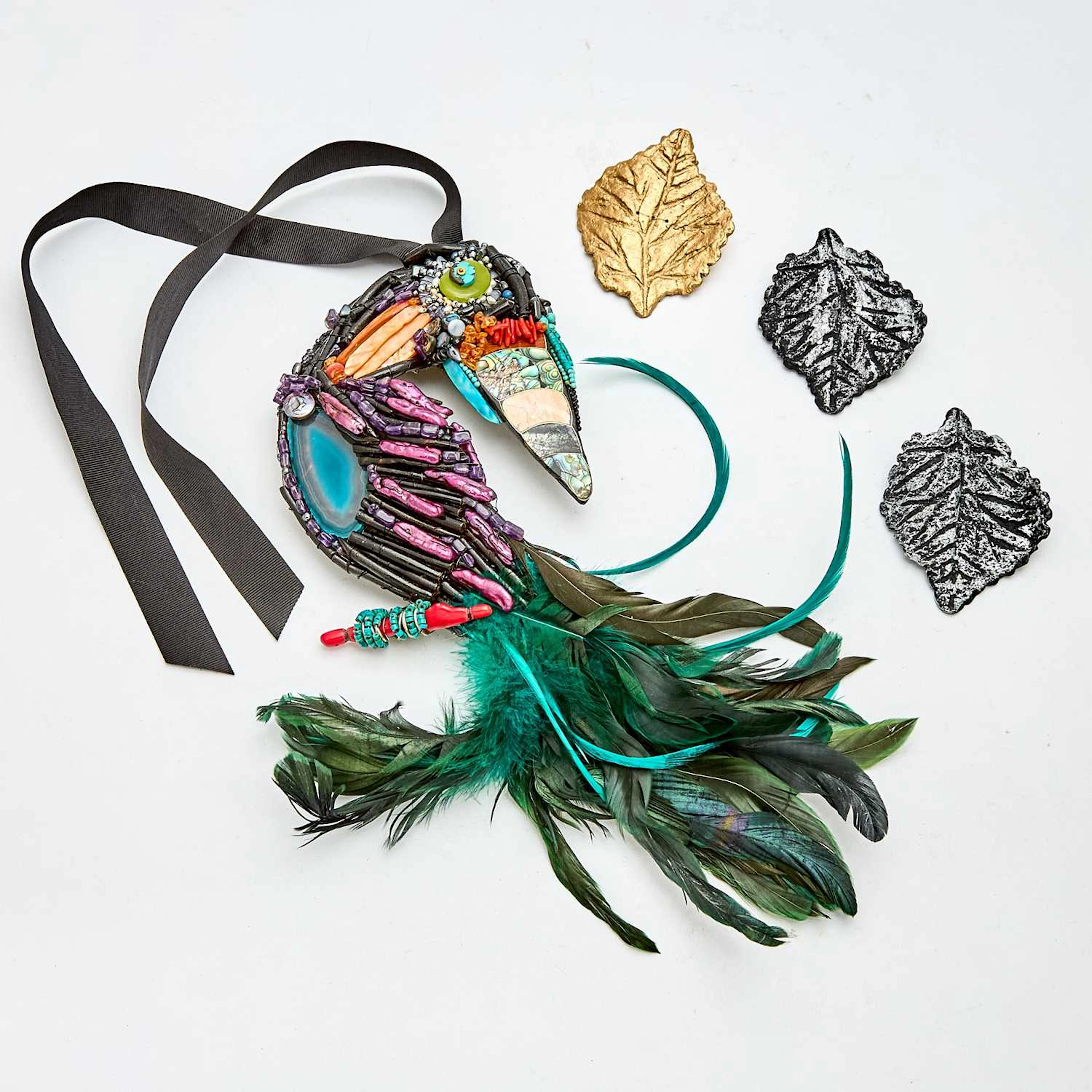 Toucan Costume Pendant Together with Three Metalic Leaf Brooches