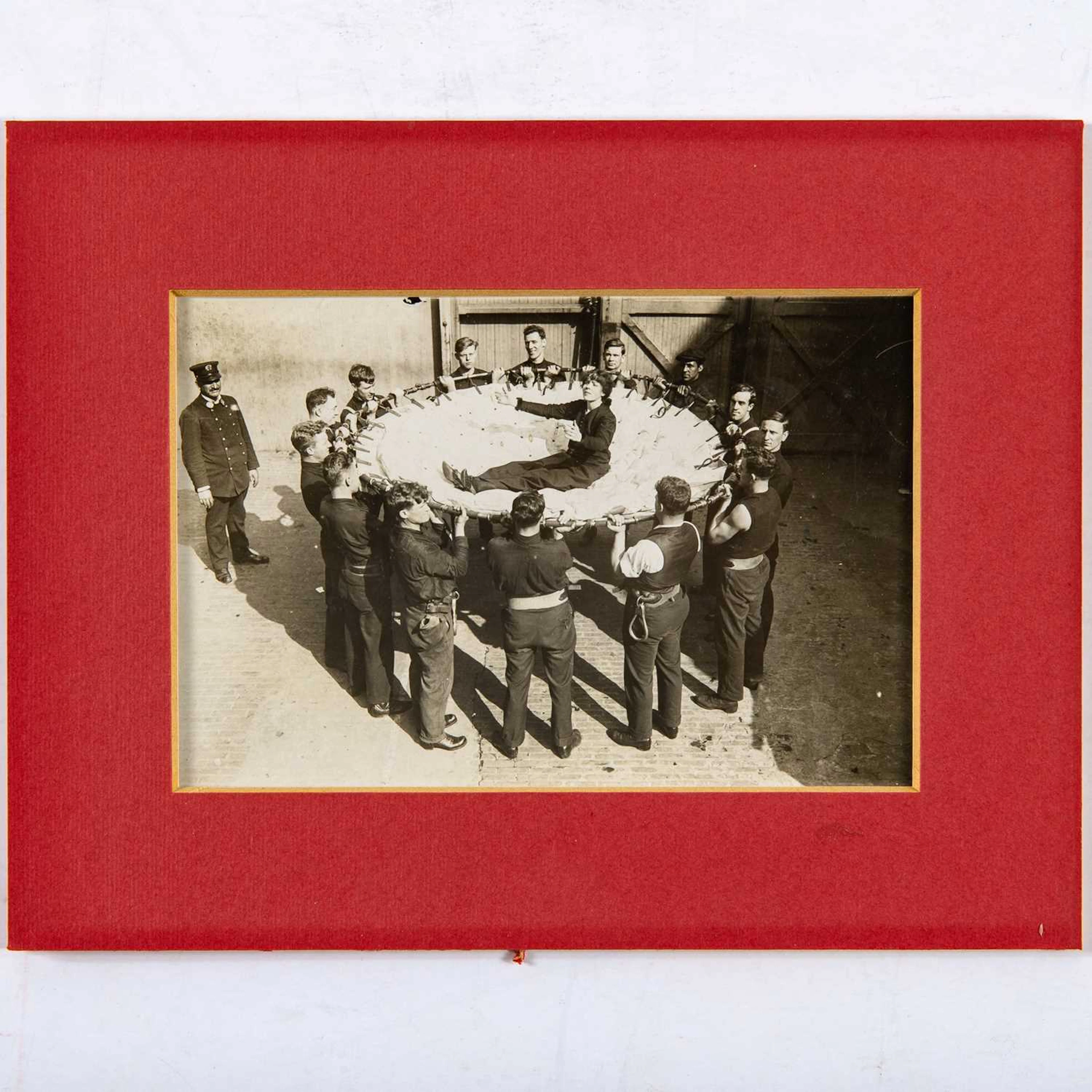 Vintage photograph of Djuna Barnes rescued by firemen