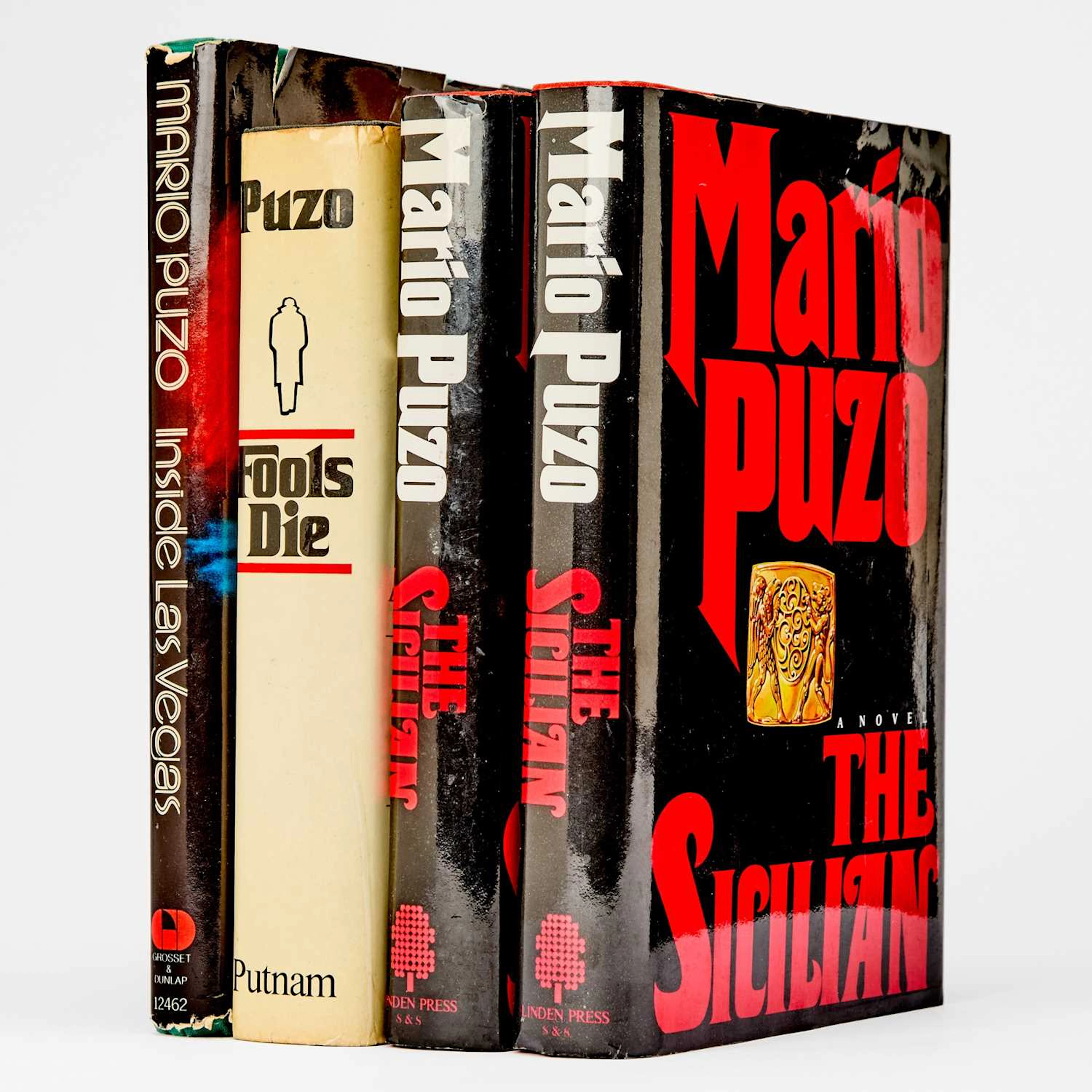 Four volumes inscribed by Mario Puzo