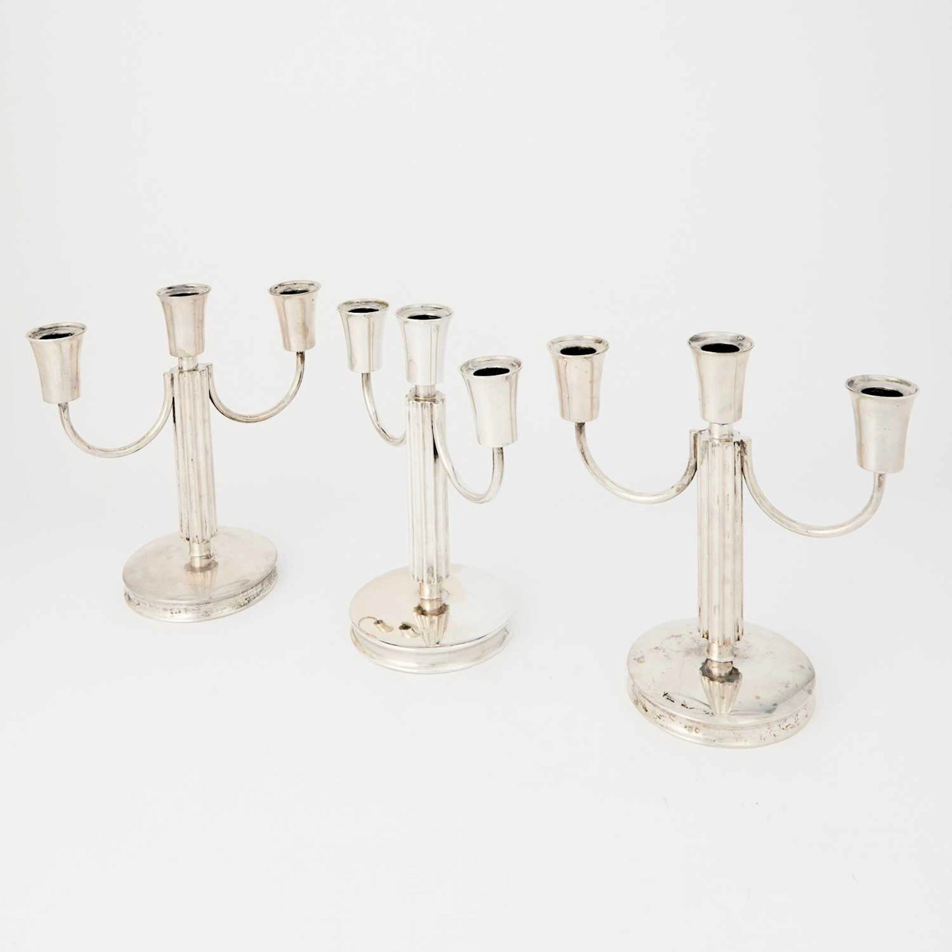 Suite of Three Continental Silver Three-Light Candelabra