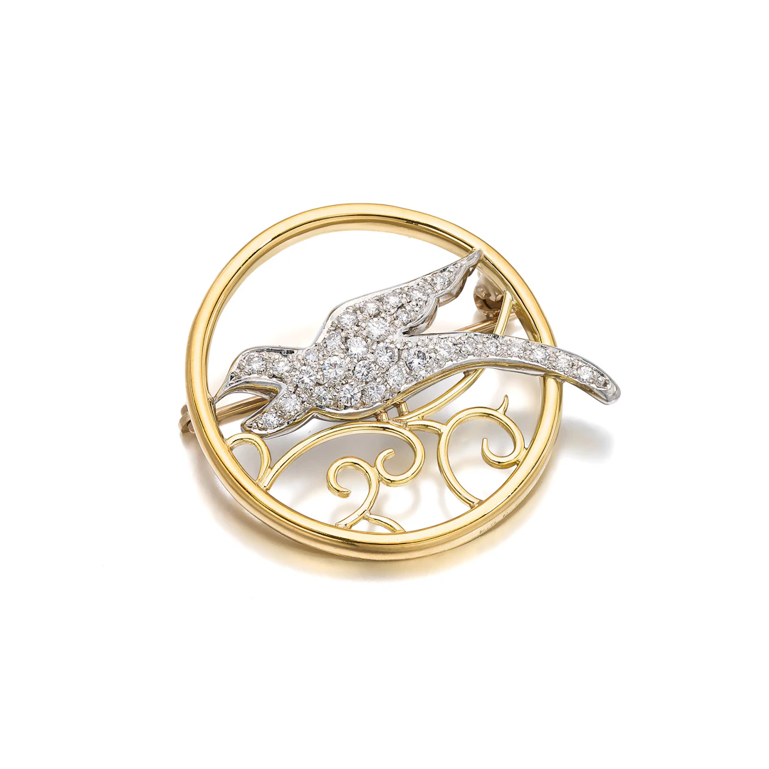 A Diamond, Platinum and Gold Brooch