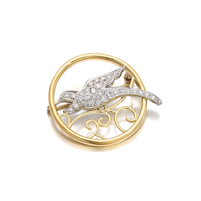 A Diamond, Platinum and Gold Brooch
