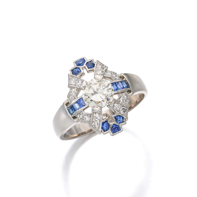A Diamond, Sapphire and White Gold Ring