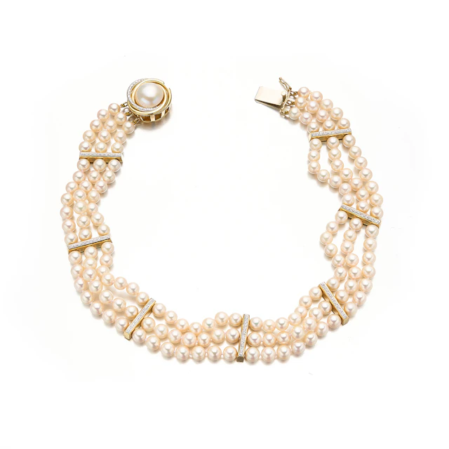 A Cultured Pearl, Diamond and Gold Necklace