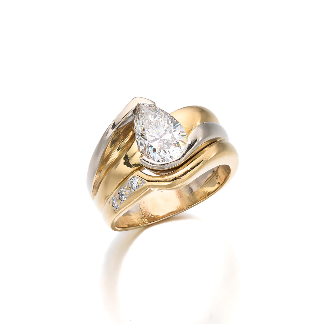 A Diamond and Two-Tone Gold Ring
