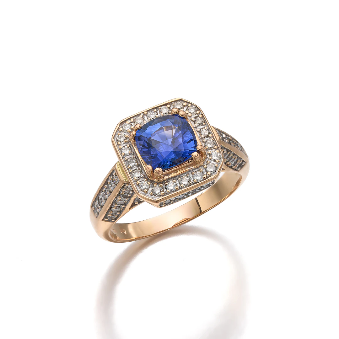 A Sapphire, Diamond and Rose Gold Ring