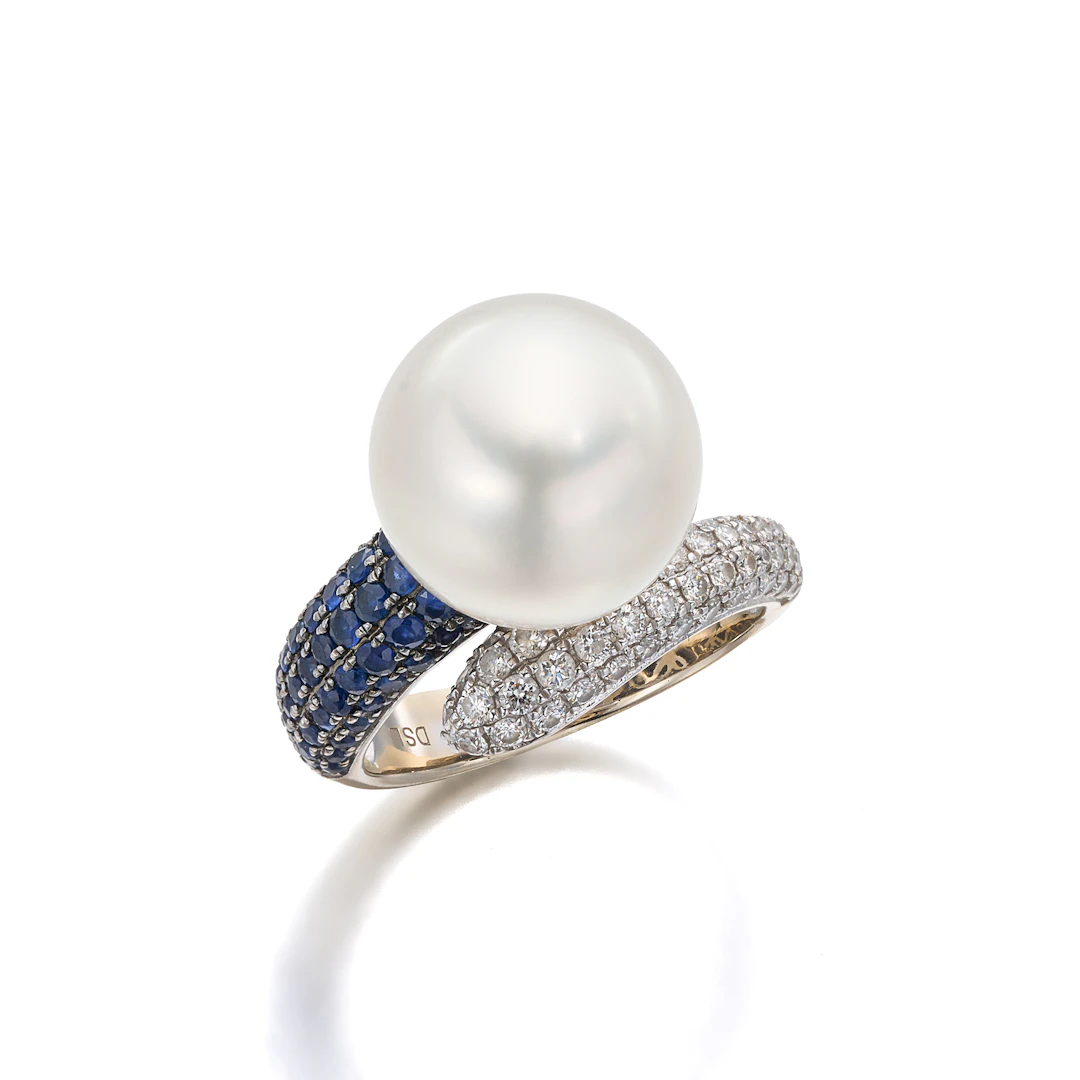A South Sea Cultured Pearl, Sapphire, Diamond and White Gold Ring