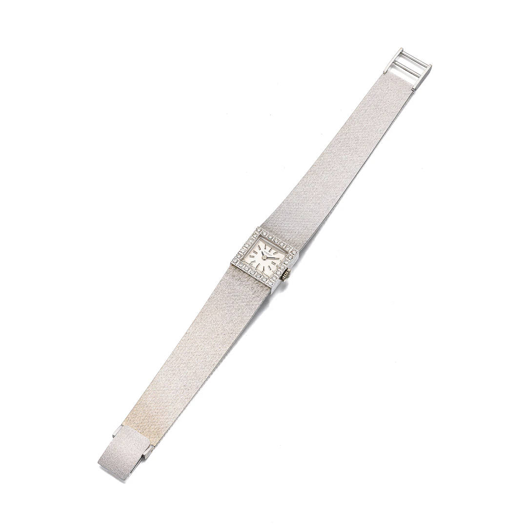 A Lady's Diamond and White Gold Wristwatch, Tissot