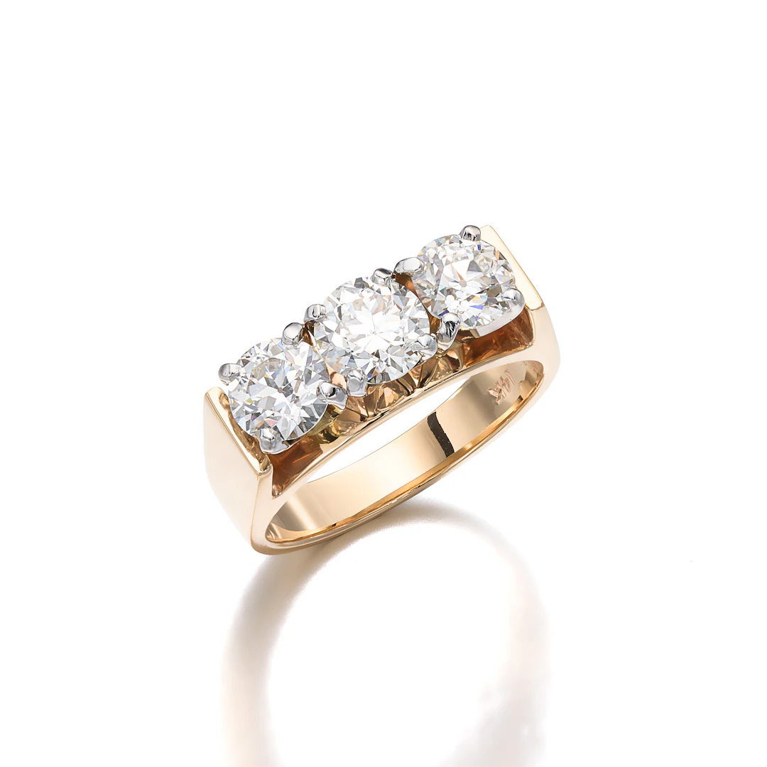 A Three-Stone Diamond and Gold Ring