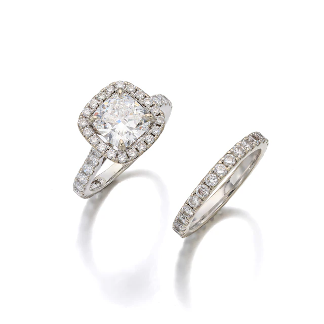 A Diamond and White Gold Ring and Eternity Band