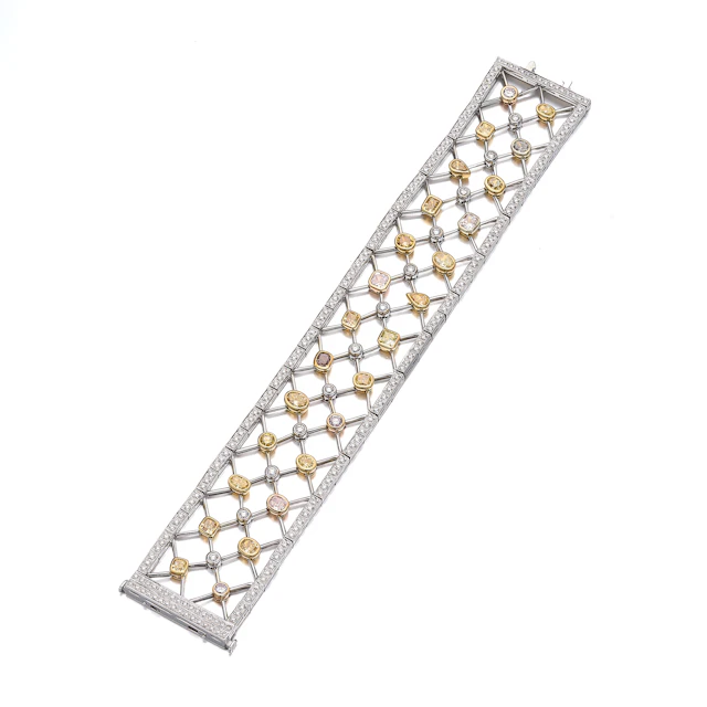 A Coloured Diamond, Platinum and Gold Bracelet