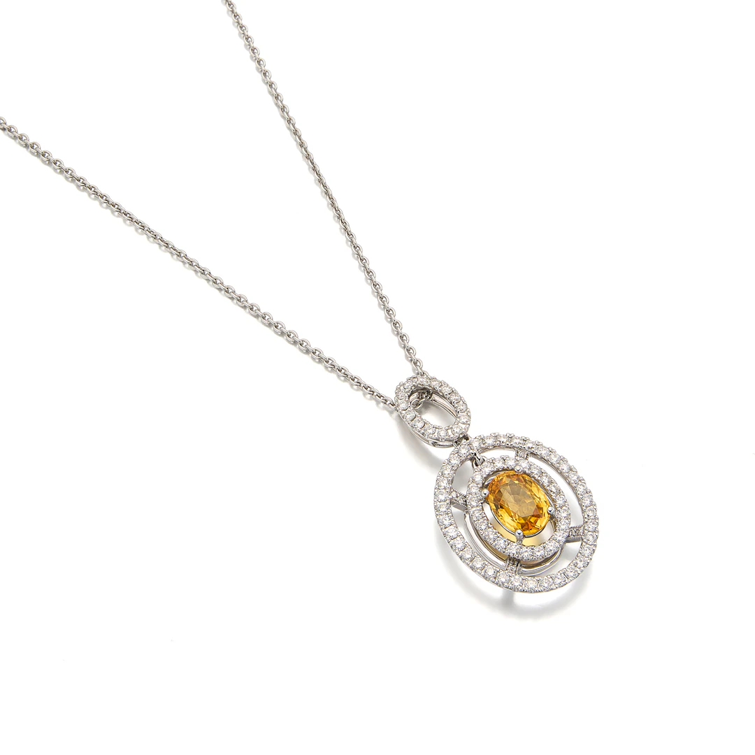 A Sapphire, Diamond and White Gold Pendant Necklace