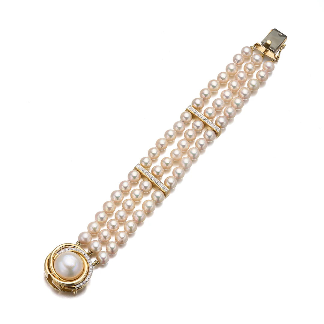 A Cultured Pearl, Diamond and Gold Bracelet