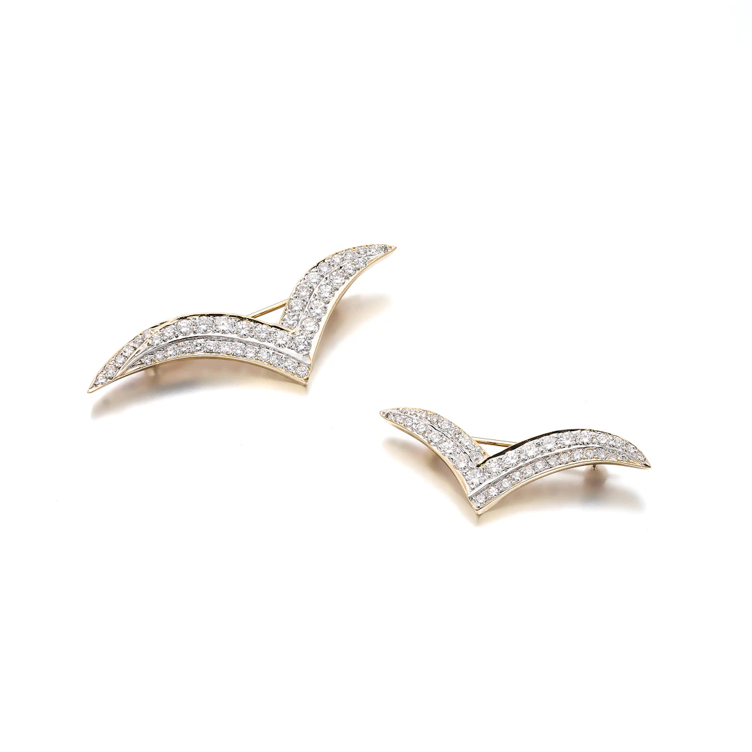 A Pair of Diamond and Gold Brooches