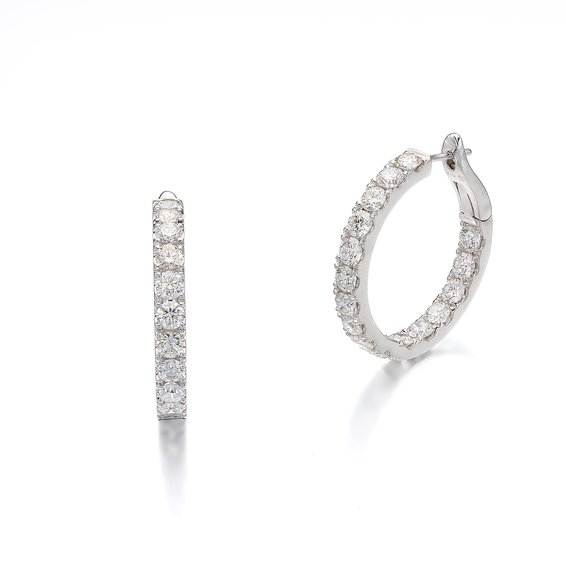 A Pair of Diamond and White Gold Hoop Earrings