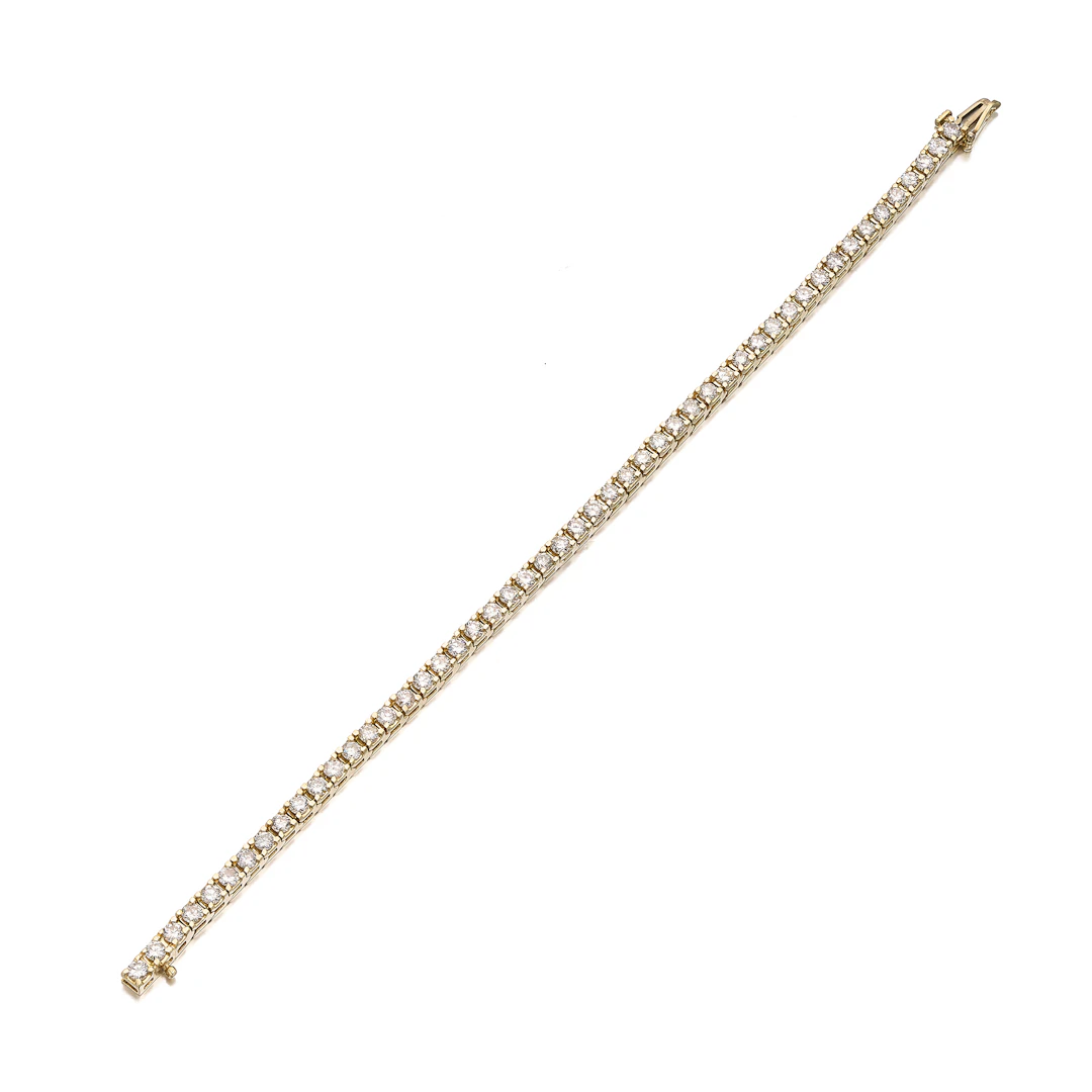 A Diamond and Gold Tennis Bracelet