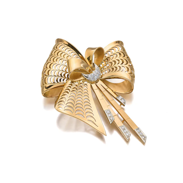 A Retro Diamond, Gold and Platinum Brooch, circa 1950