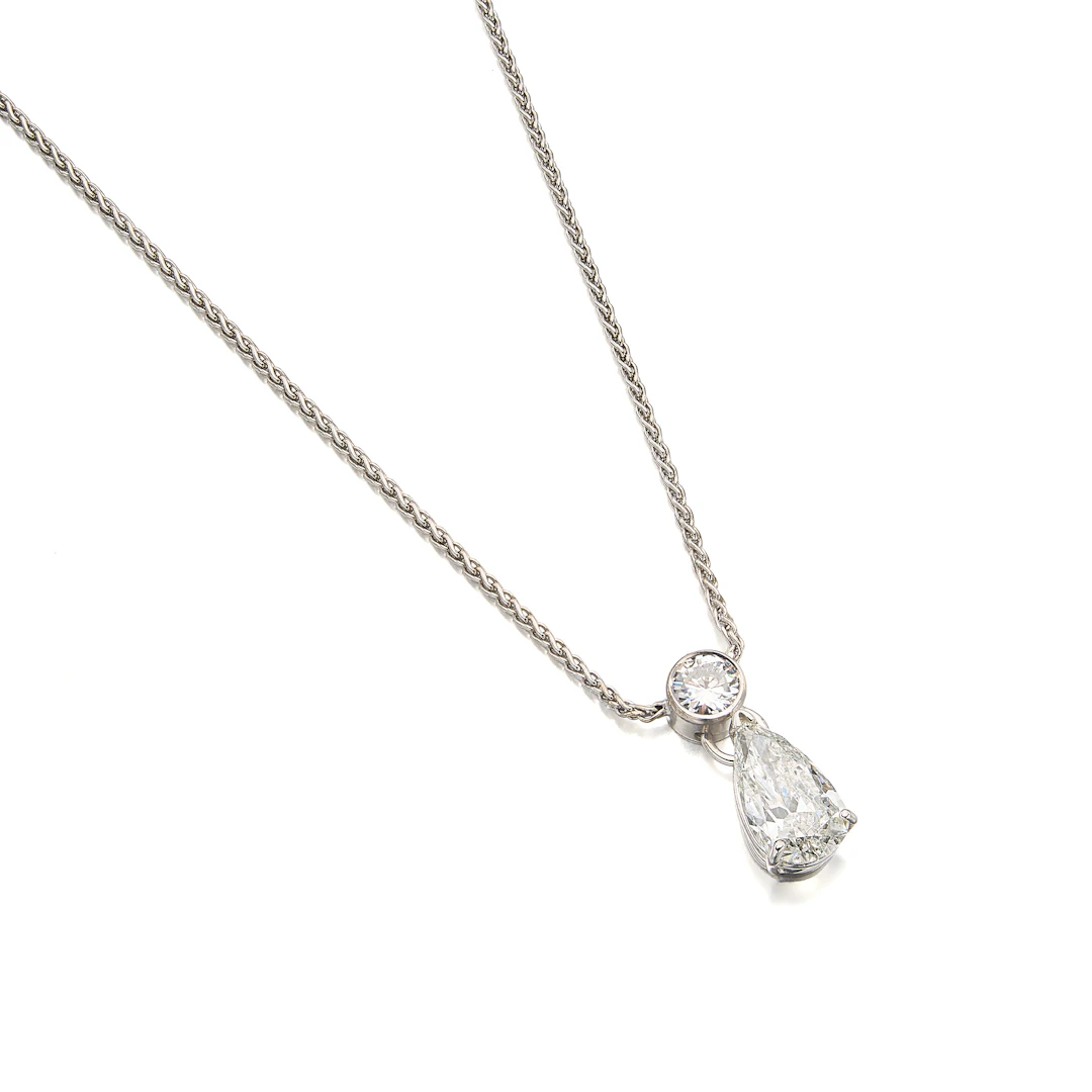 A Diamond and White Gold Pendant Necklace