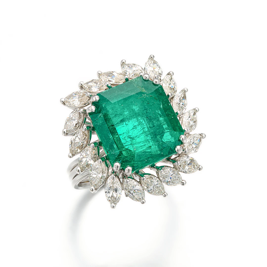 An Emerald, Diamond and Platinum Ring