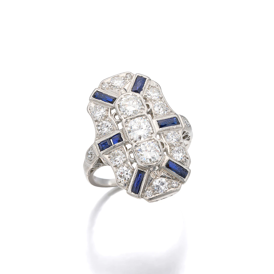 A Diamond, Synthetic Sapphire and Platinum Ring, circa 1930