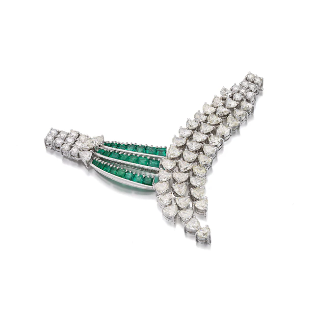 An Emerald, Diamond, and White Gold Jewel