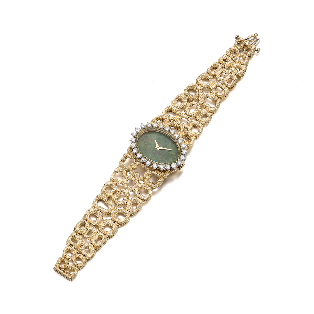 A Lady's Diamond and Gold Wristwatch