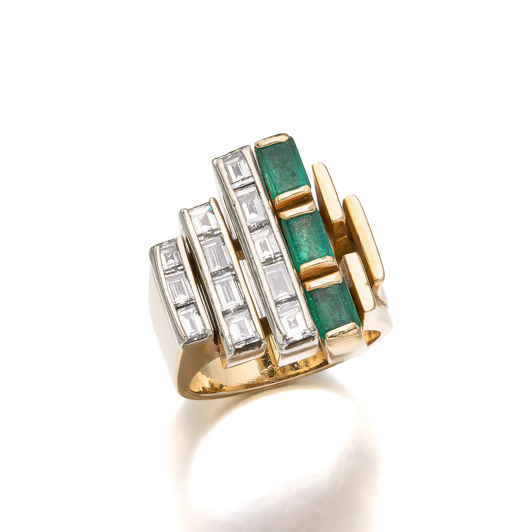 An Emerald, Diamond and Gold Ring