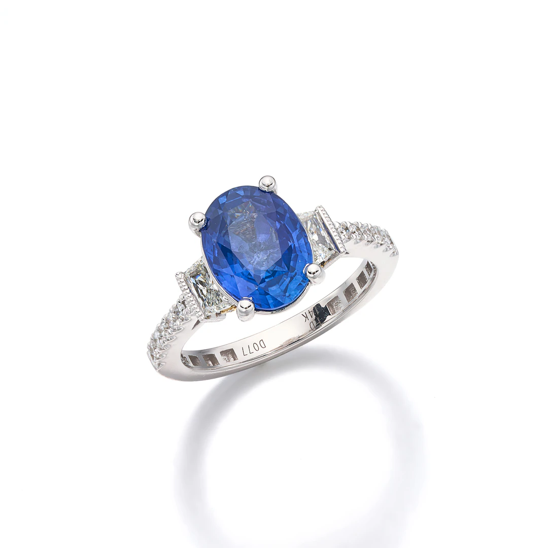 A Sapphire, Diamond and White Gold Ring