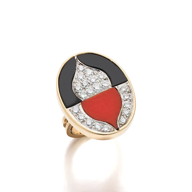 A Coral, Onyx, Diamond and Gold Ring