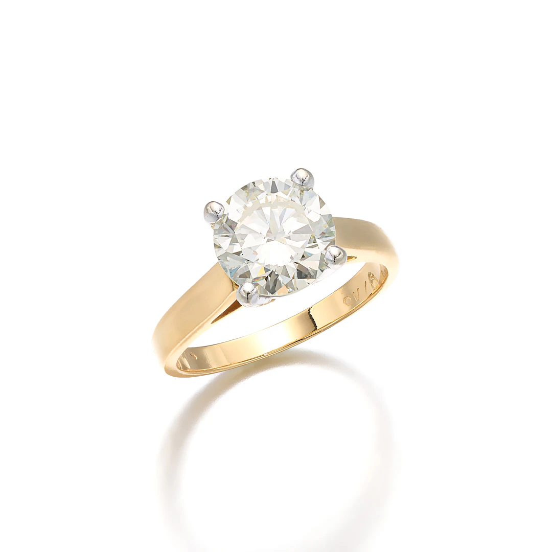 A Diamond Solitaire and Gold Ring, Birks