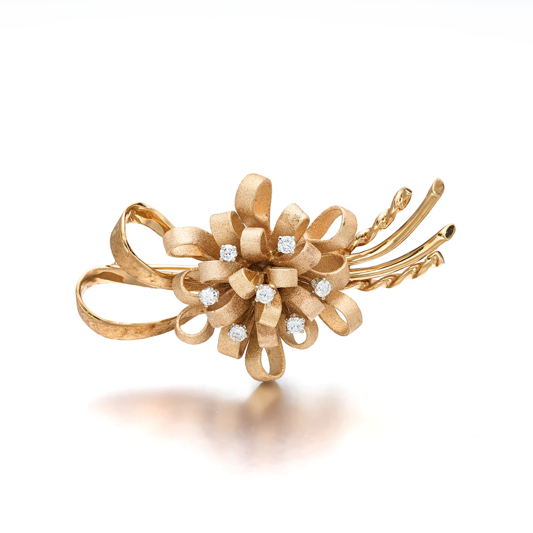 A Diamond and Gold Brooch