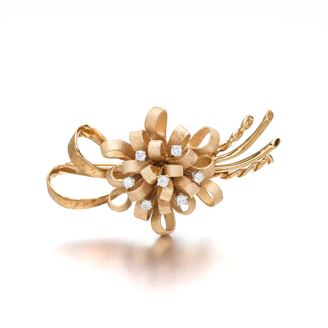 A Diamond and Gold Brooch