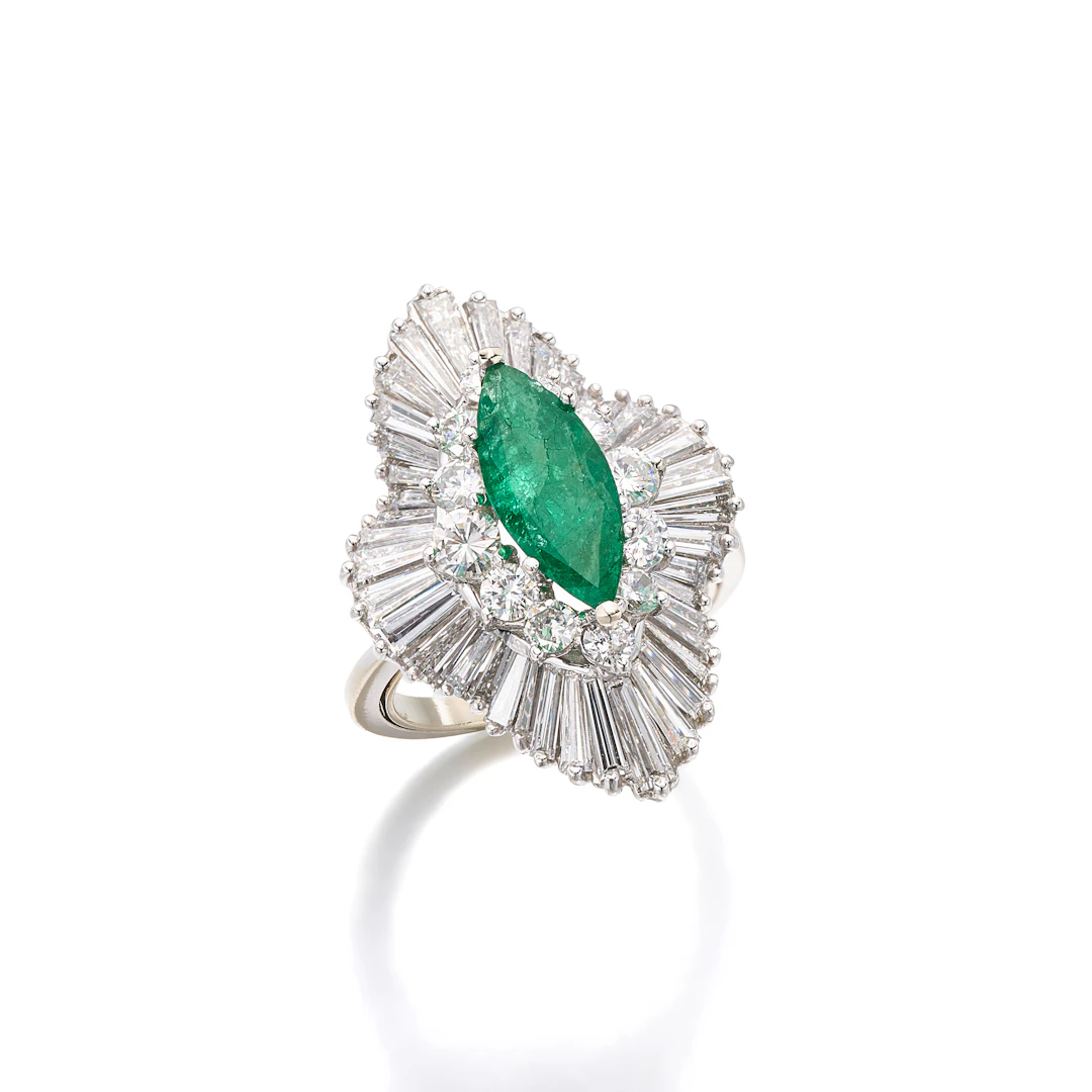 An Emerald, Diamond and White Gold Ballerina Ring