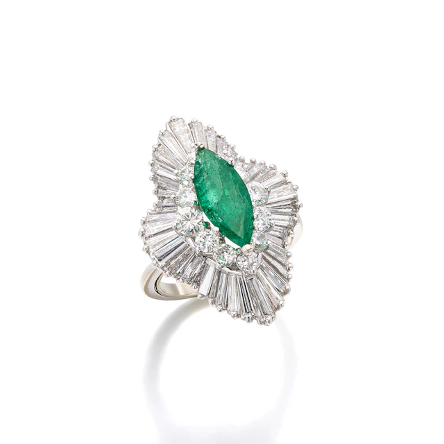 An Emerald, Diamond and White Gold Ballerina Ring