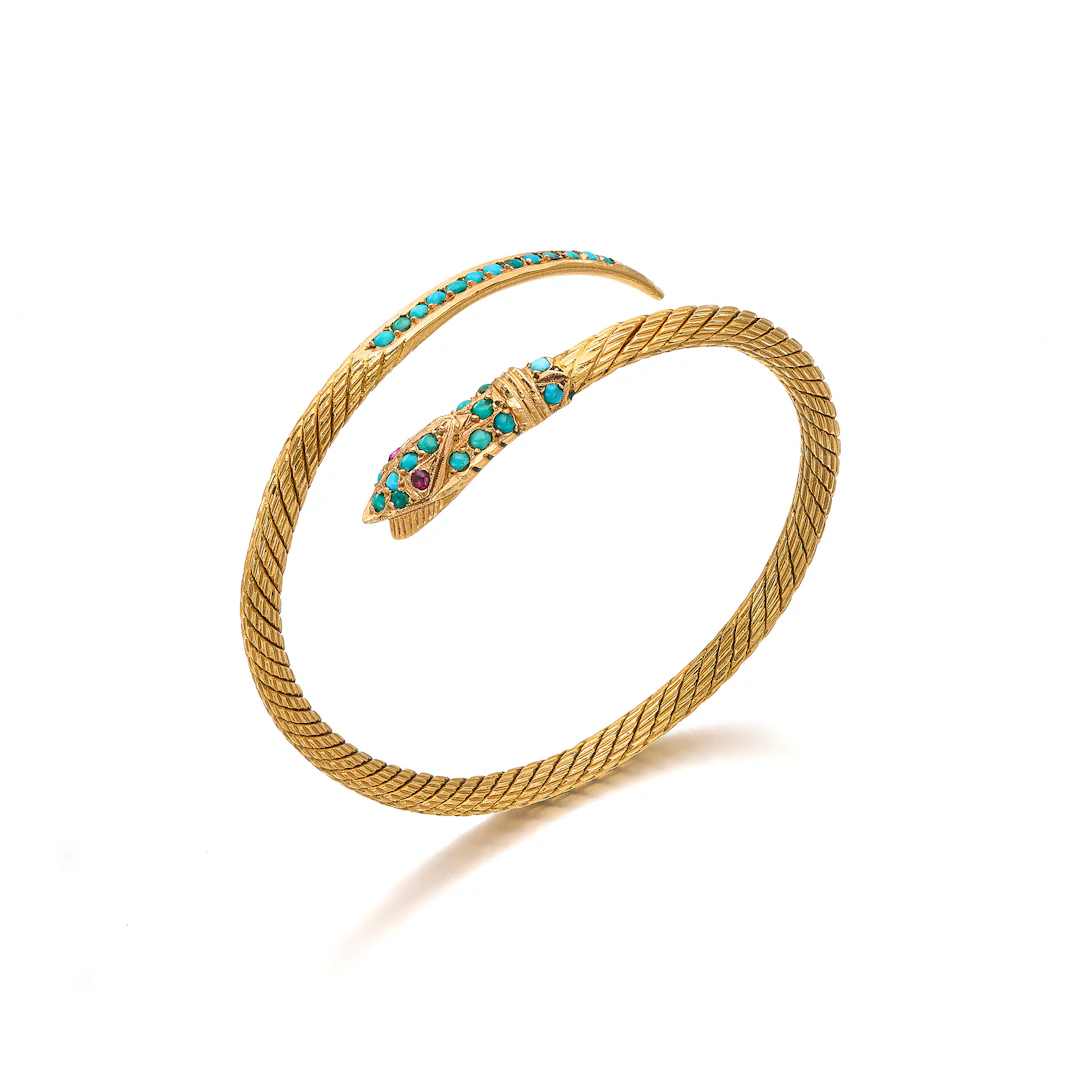 A Turquoise, Ruby and Gold Bangle Bracelet