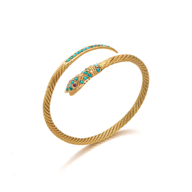 A Turquoise, Ruby and Gold Bangle Bracelet